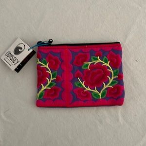 Hand embroidered zippered wallet/ change purse/ makeup bag.